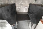 We added diagonal back support to allow for 3 forward facing passengers.  The workstation table had to be removed.