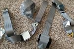 Two shoulder belts and one lap belt from SeatBeltsPlus.com.  They will be bolted through the cab floor.